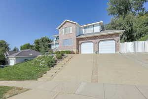 View of front facade featuring a garage