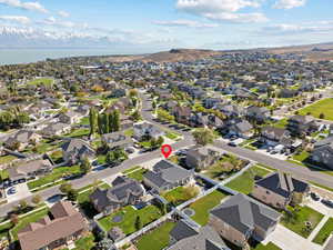 Aerial view featuring a water and mountain view