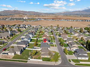 Birds eye view of property with a mountain view