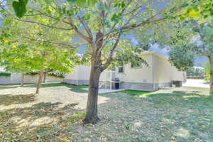 View of yard featuring central AC