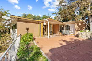 Front view of house with a patio