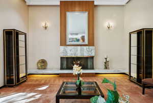 Interior space featuring crown molding,, and a high end fireplace