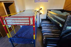 Bedroom featuring hardwood / wood-style flooring