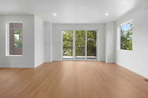 Spare room featuring light hardwood / wood-style floors