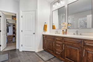 Bathroom featuring vanity and tile patterned floors