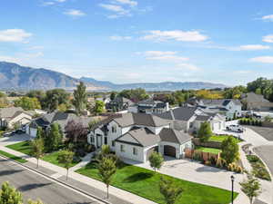 Birds eye view of property with a mountain view