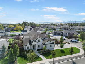 Birds eye view of property with a mountain view