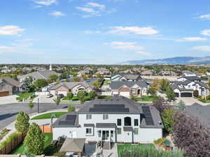 Birds eye view of property with a mountain view