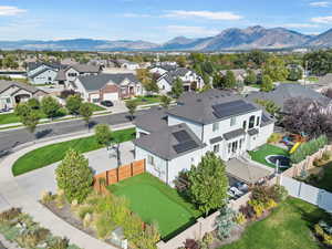 Birds eye view of property with a mountain view