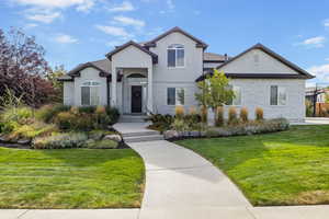 View of front of house with a front lawn