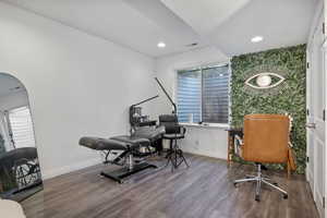 Home office featuring hardwood / wood-style flooring