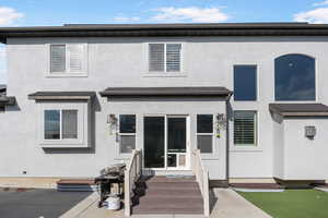 View of front of home featuring a patio area