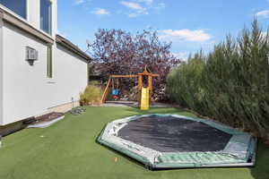 View of yard with a playground