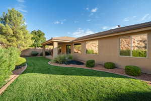 View of front of house with a front yard