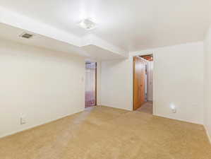 View of carpeted spare room