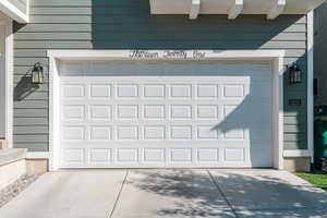 Garage featuring wood walls