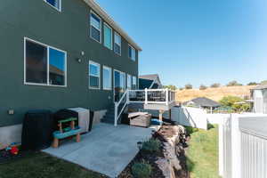 Rear view of house with a patio area