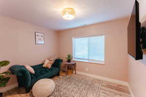 Living area featuring light wood-type flooring