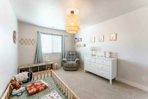 Bedroom featuring carpet flooring