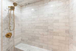 Bathroom with tiled shower