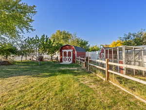 View of yard with large shed