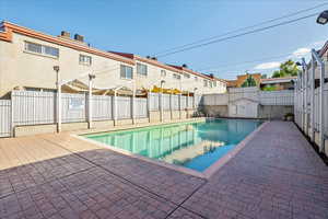 View of pool with a patio area