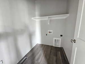 Washroom featuring dark wood-type flooring, electric dryer hookup, and washer hookup