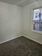 View of carpeted spare room