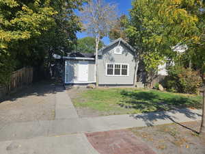 View of front of house with a front yard