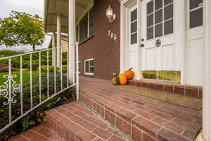 Entry with Porch spanning the length of the home!