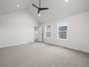 Master Bedroom with high vaulted ceiling featuring ceiling fan, and carpet floors