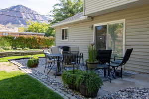 View of patio / terrace with a mountain view