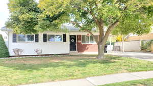 View of front of home featuring a front lawn