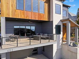 Rear view of property featuring a balcony