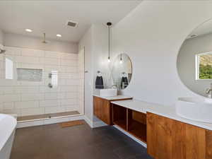 Master Bathroom with vanity and plus walk in shower