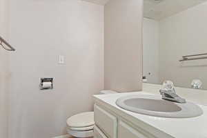 Bathroom with vanity and toilet