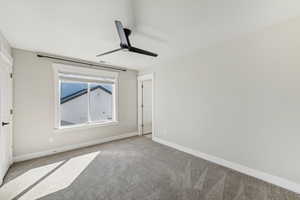 Unfurnished bedroom with carpet flooring and ceiling fan