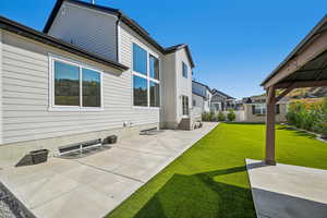 View of yard with a patio