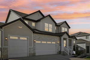 Craftsman inspired home with a garage