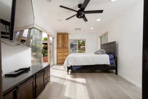 Bedroom featuring light hardwood / wood-style floors and ceiling fan