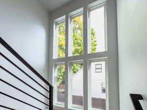 Doorway to outside with a high ceiling