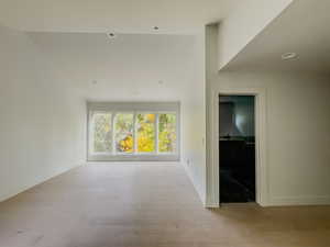 Empty room featuring light hardwood / wood-style flooring