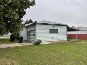 View of home's exterior featuring a lawn