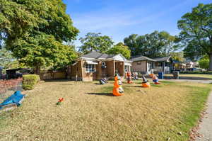 View of front of property featuring a front yard