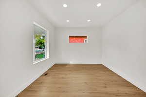 Spare room featuring light hardwood / wood-style floors