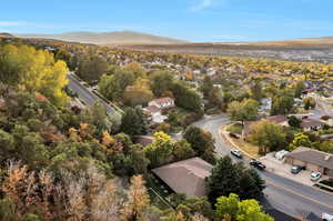 Birds eye view of property with a mountain view