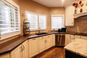 Sooooo much natural light!!! Wood Shutters add the perfect touch!