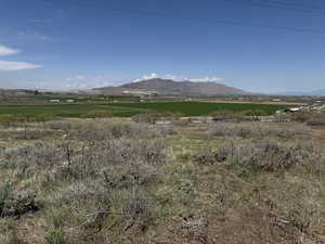 Property view of mountains with a rural view