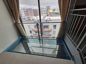 Beautiful Custom Glass Floor with color changing lights & Roll up Door/Balcony!