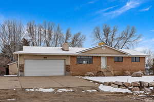 Ranch-style house with a garage